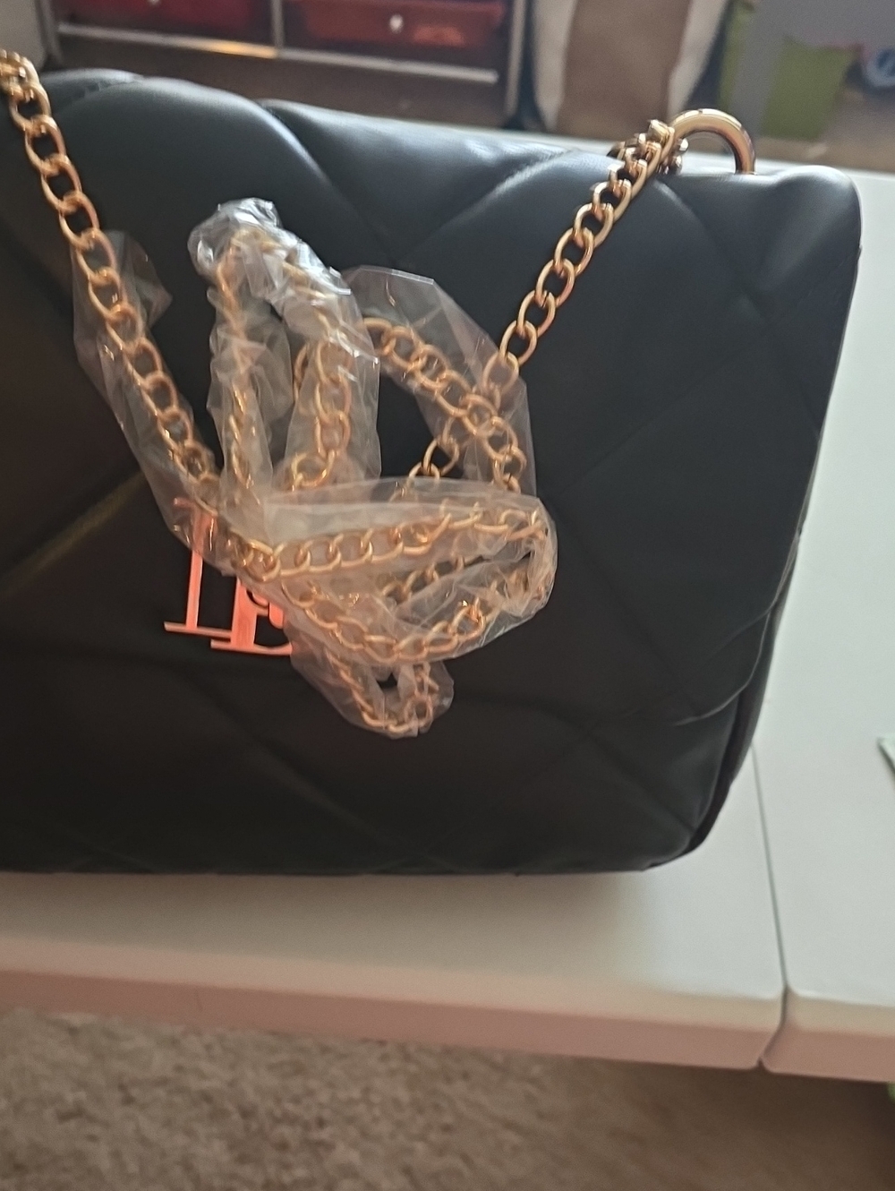 Quilted Black Shoulder Bag with Gold Chain